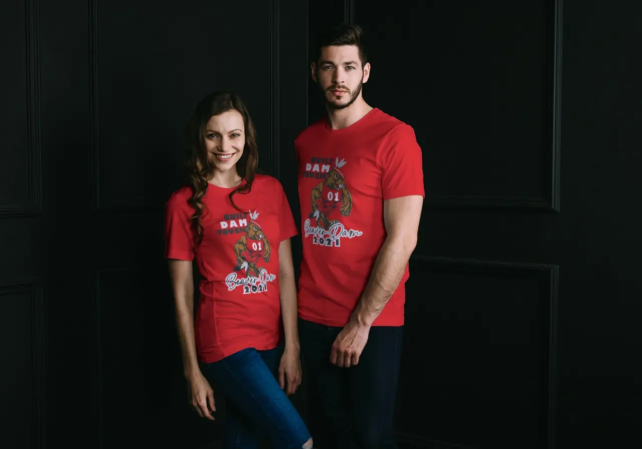 Man and woman sporting Beaver Dam fan shirts